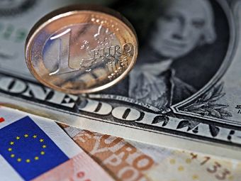 Доллар борется за равенство с евро 